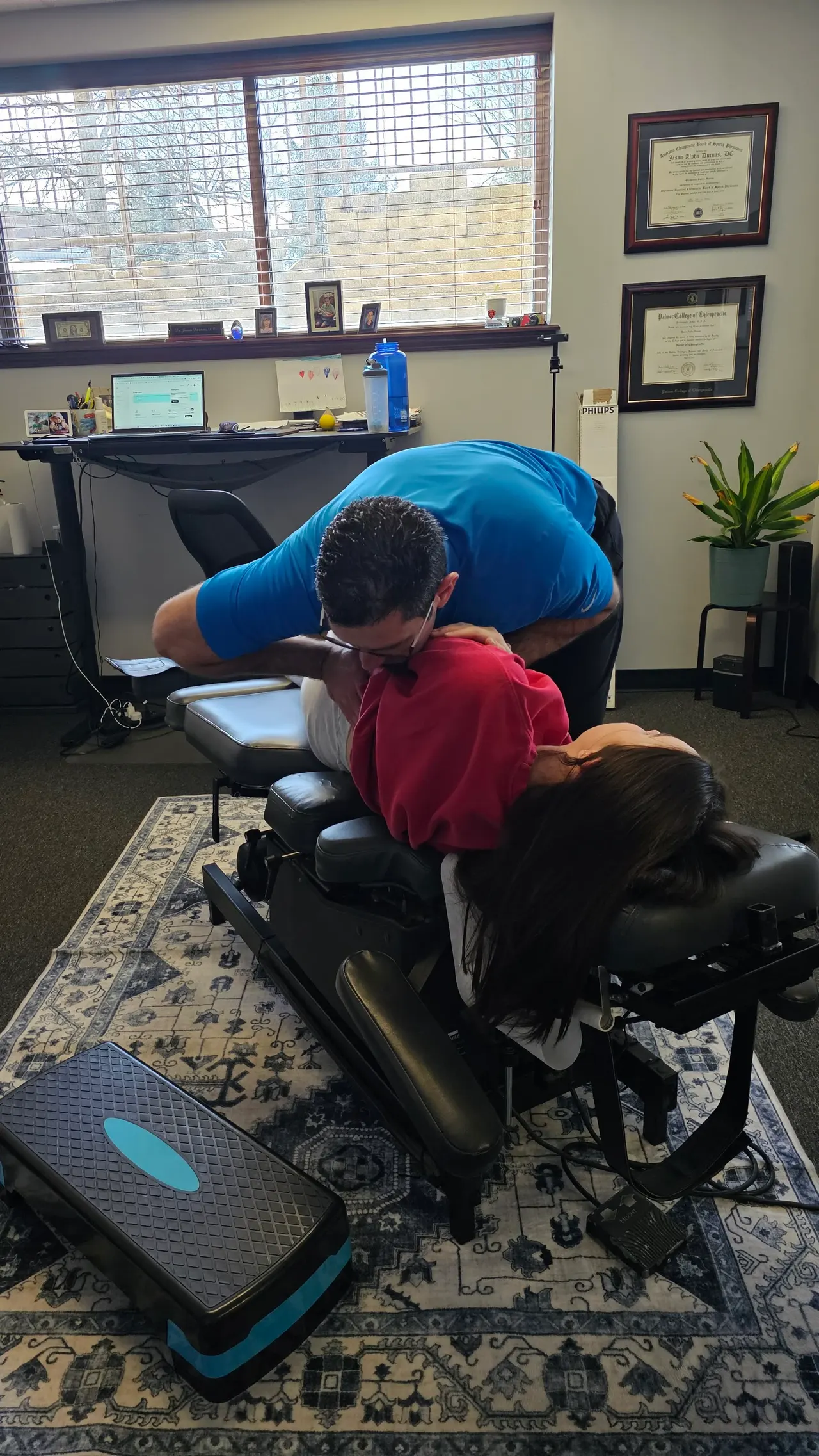 Dr. Durnas adjusting a patient on the drop table