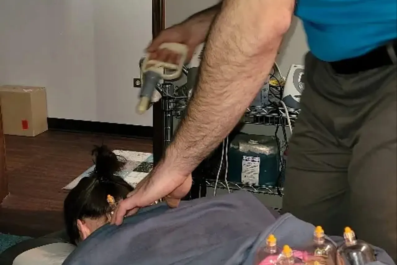 A handheld instrument worked along a patient's back
