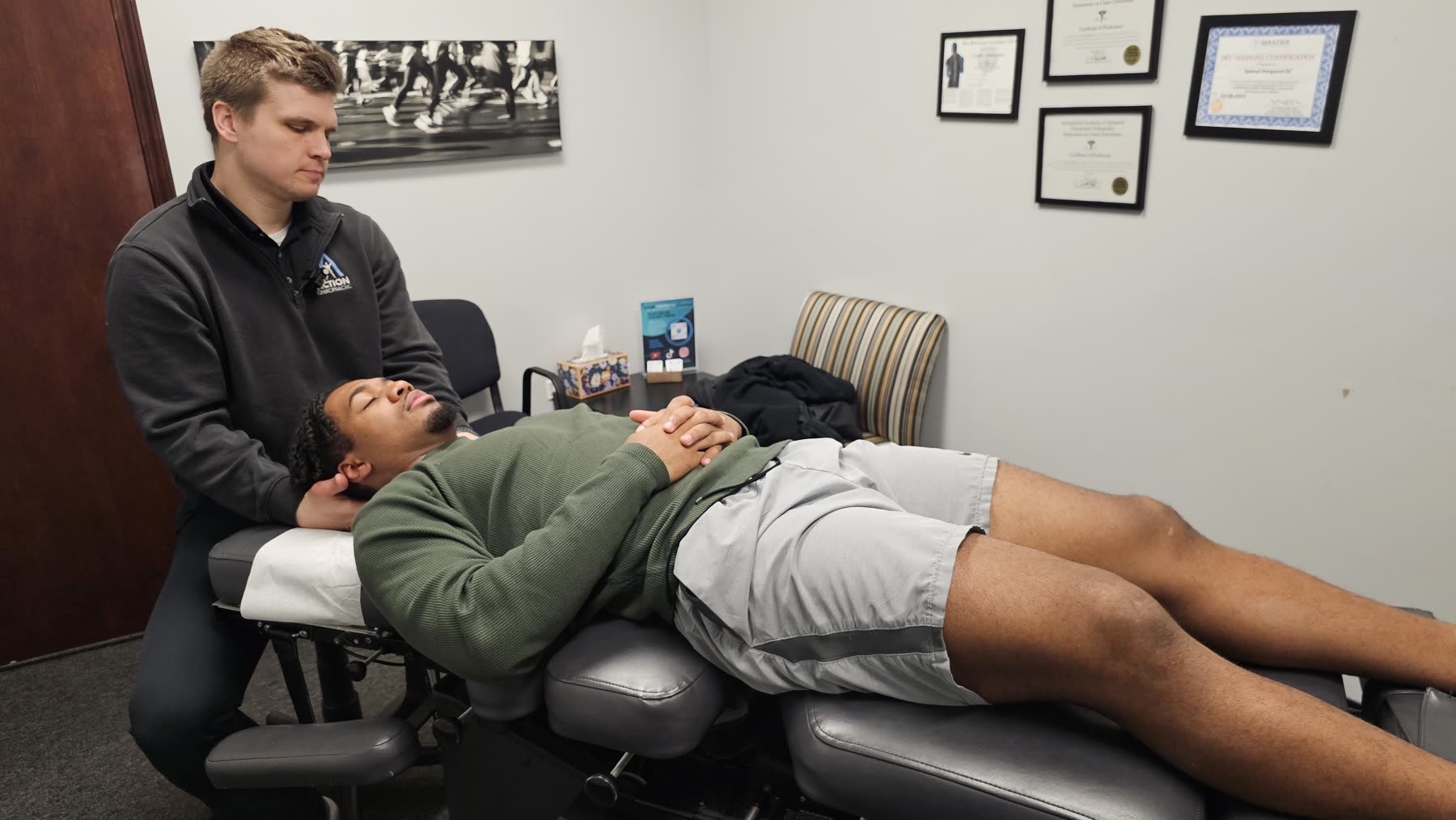 Dr. Norgaard treating a young athlete on the table